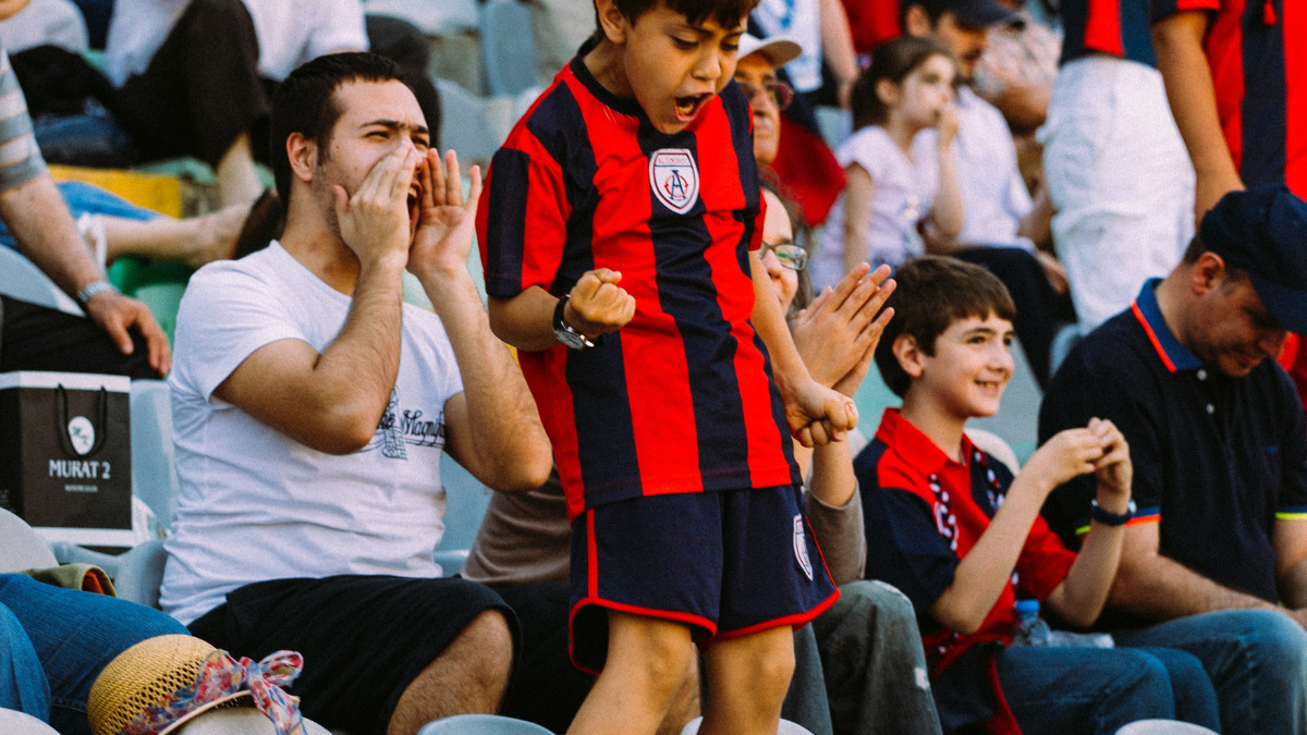 Image of young fan cheering