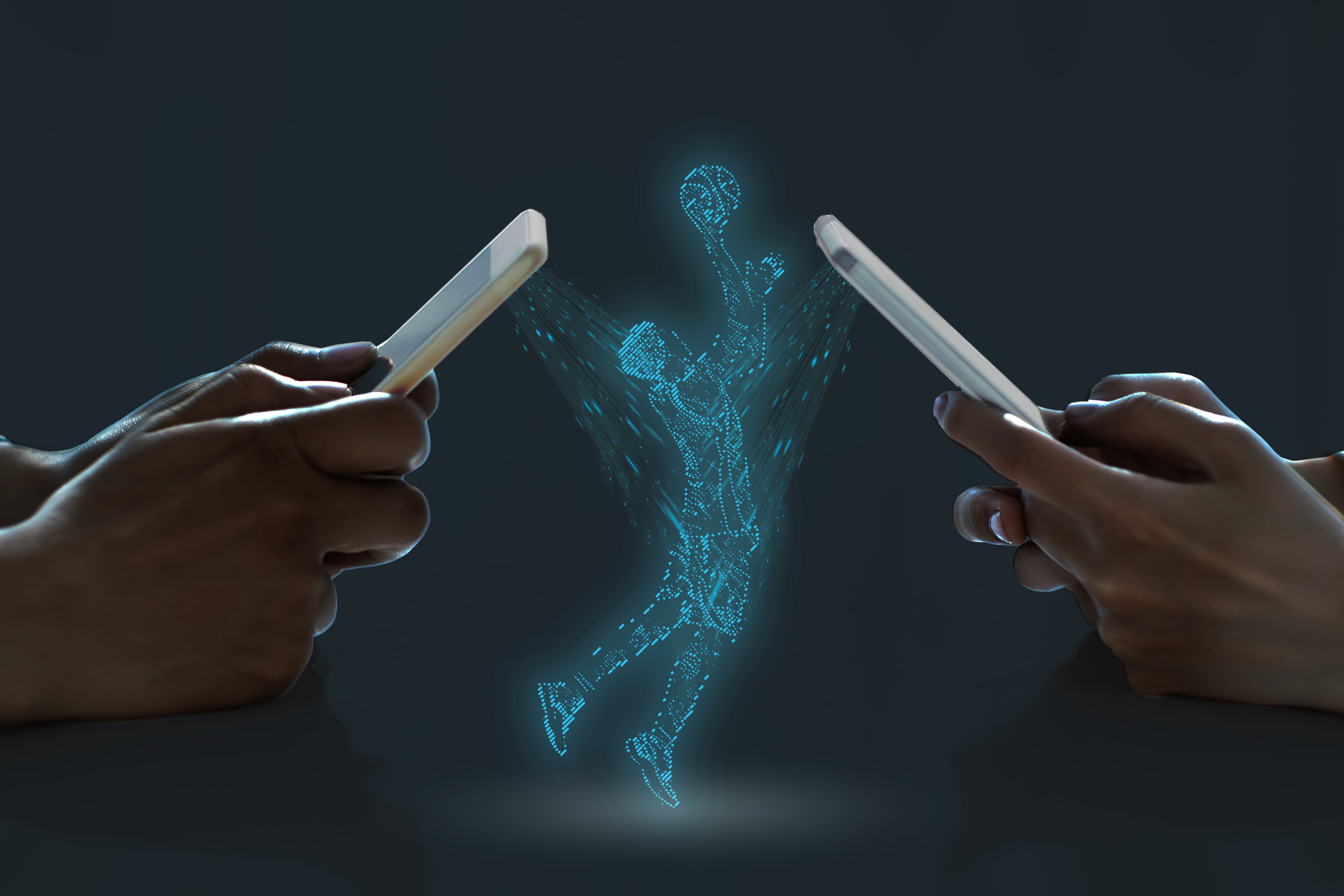 Two phones connecting together to create a hologram image of an athlete